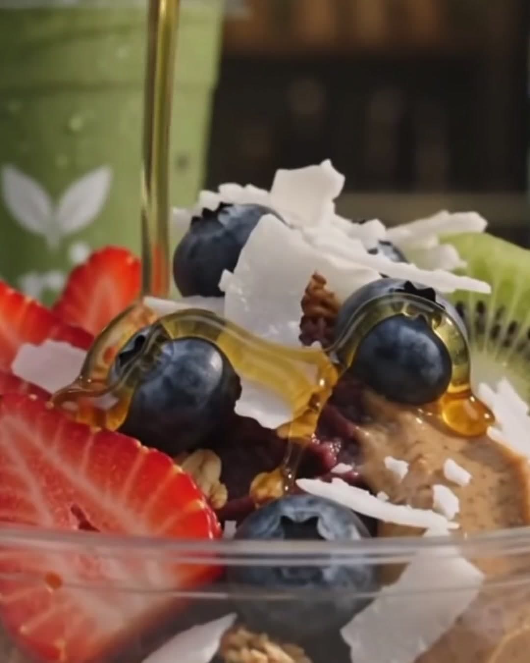 Acai bowls topped with fresh fruit on the counter at Thrive